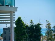 Modern unit steps to the sand