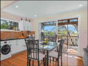 Modern unit with shared garden and deck on the top of...