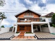 Modern Wood Inspired Home with Scenic Ridge Views