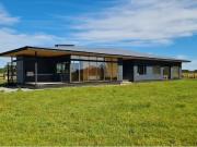Moderna casa en condominio La Reserva Frutillar