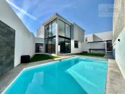 MODERNA PROPIEDAD CON IMPONENTE DOBLE ALTURA, DOBLE...