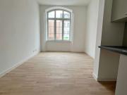 Moderne 1 Raum Wohnung im sanierten Gymnasiumgebäude