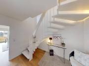 Moderne Dachgeschoss Maisonette in Wien Mauer mit zwei...