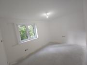 Moderne Dachgeschosswohnung im Dreiparteienhaus in...