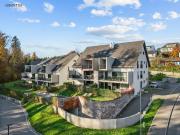 Moderne Dachmaisonette mit Einfamilienhaus Charakter...