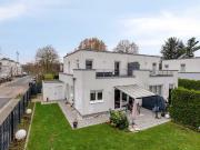 Moderne Doppelhaushälfte mit sonnigem Garten,...