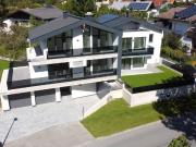 Moderne dreistöckige Wohnung mit Gartenanteil im...