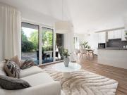 Moderne Eleganz trifft auf naturnahes und zentrales Wohnen