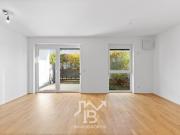 Moderne, großzügige Gartenwohnung mit Tiefgaragen Stellplatz