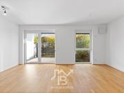 Moderne, großzügige Gartenwohnung mit Tiefgaragen Stellplatz