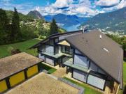 Moderne HUF HAUS Villa mit Panoramablick auf den Luganersee