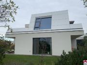Moderne lichtdurchflutete Traumvilla in bester Lage am See