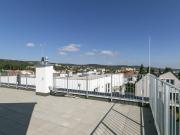 Moderne mehrgeschoßige Wohnung mit großer Dachterrasse