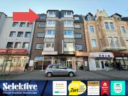 Moderne Praxis in der Fußgängerzone im Stadtzentrum von...