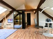 Moderne Rückzugsoase: Elegante Dachwohnung mit...