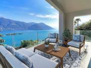 Moderne trifft Tessiner Charme Villetta mit Seesicht