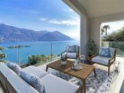 Moderne trifft Tessiner Charme Villetta mit Seesicht