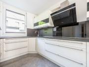 Modernes Reihen­mit­telhaus in famili­en­freund­licher...
