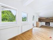 Modernisierte Dachgeschosswohnung in Hopfgarten –...