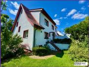 Modernisierte Haushälfte mit idyllischem Garten