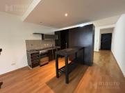 Monoambiente dividido al frente con balcon y placard en...