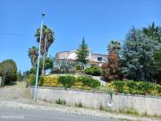 Moradia com 4 sutes, piscina e casa de hspedes