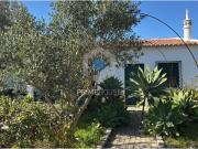 Moradia com Potencial Único para Viver ou Investir em...