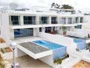 Moradia de Arquitectura Contemporânea Junto à Praia com...