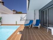 Moradia em Banda T3+1, arquitetura contemporânea com...