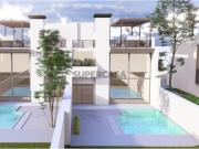 Moradia em construção com jardim e piscina privativa em...