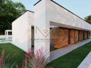 MORADIA ISOLADA V4 COM PISCINA E GARAGEM EM CONSTRUÇÃO