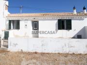 Moradia T1 com pátio e terreno com ruína Faz Fato, Tavira