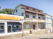 Moradia T3+1 com Espaços Comerciais e Terreno em Priscos...