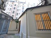 NATION Dans un immeuble hausmannien