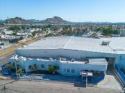 Nave industrial con terreno y construcción