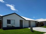 NEAR NEW DUPLEX WITH AIR CONDITIONING AND LOCK UP GARAGE