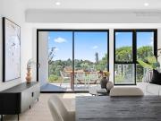 Near new, never occupied, designer duplex with parkland...