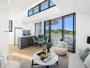 Near new penthouse with stunning ocean views, soaring...