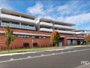 NEAR NEW TWO BEDROOM APARTMENT IN GLENMORE VILLAGE PRECINCT