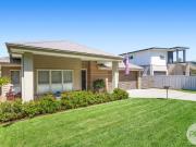 NEAR NEW, ULTRA MODERN HOME IN PRIME LOCATION!