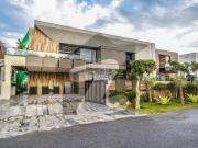 Near raya 1 kanal royal bungalow with unmatched...