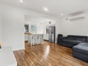 Neat 4 Bedroom Home with Extra Large Double Garage