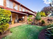 neat and tiled 3 bedroom home with garage