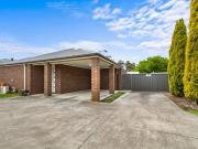 Neat, Modern Unit Ideal for Living or Investing