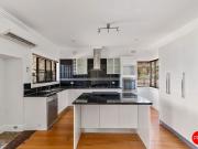 Neat three bedroom home Includes a gardener