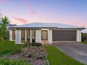 Ideal Family Home Nestled Within The Prestigious Coomera...