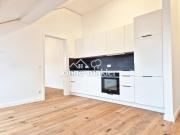 Neubau Dachgeschosswohnung in charmantem Bestandshaus