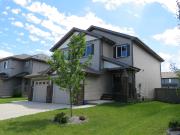 FREE RENT! Half Duplex Single car garage and fenced in yard!