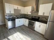 Nicely Renovated Radisson Heights with a 5 minute walk...