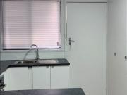 North Central 2 Bedroom Unit with separate Carport